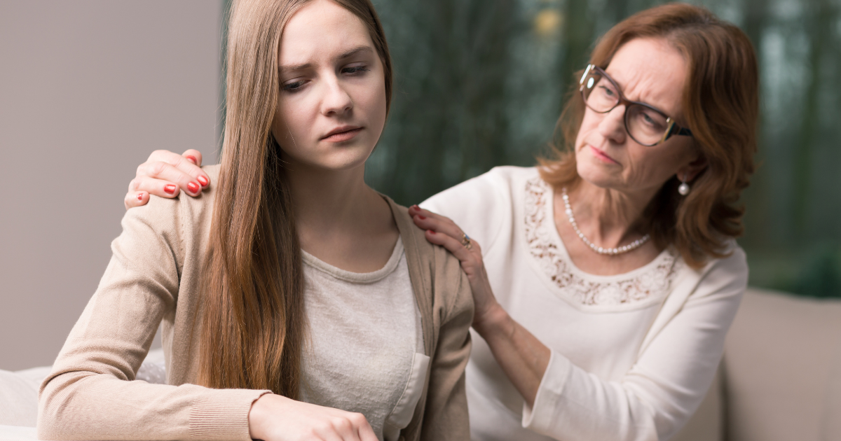 What if My Child is Accused of a Crime - woman comforting a teenage girl